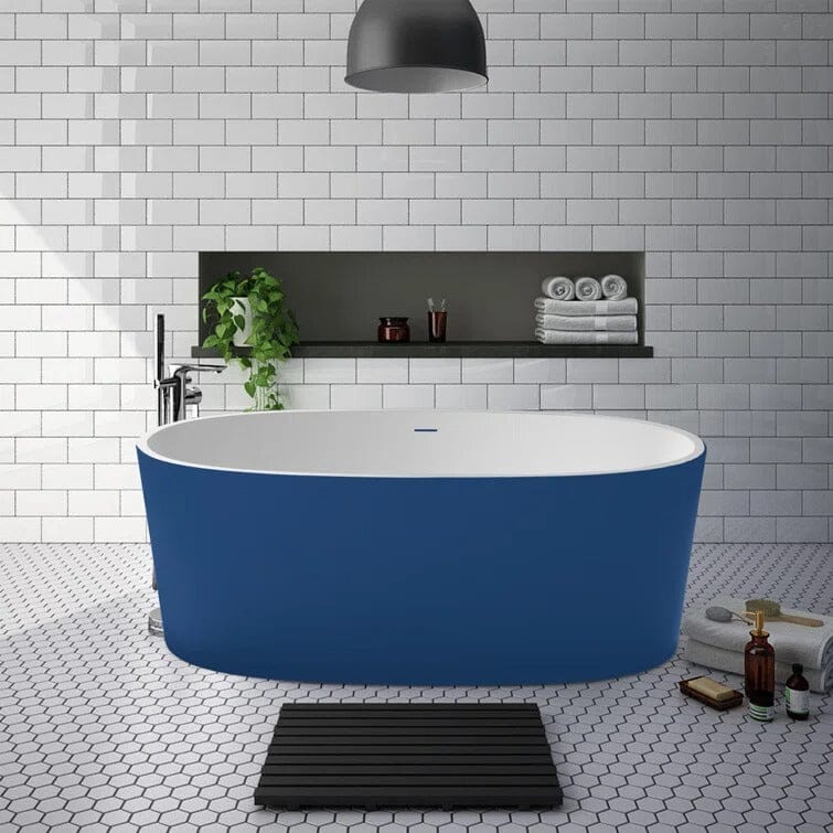 Modern bathroom with freestanding bathtub, modern taps and blue
