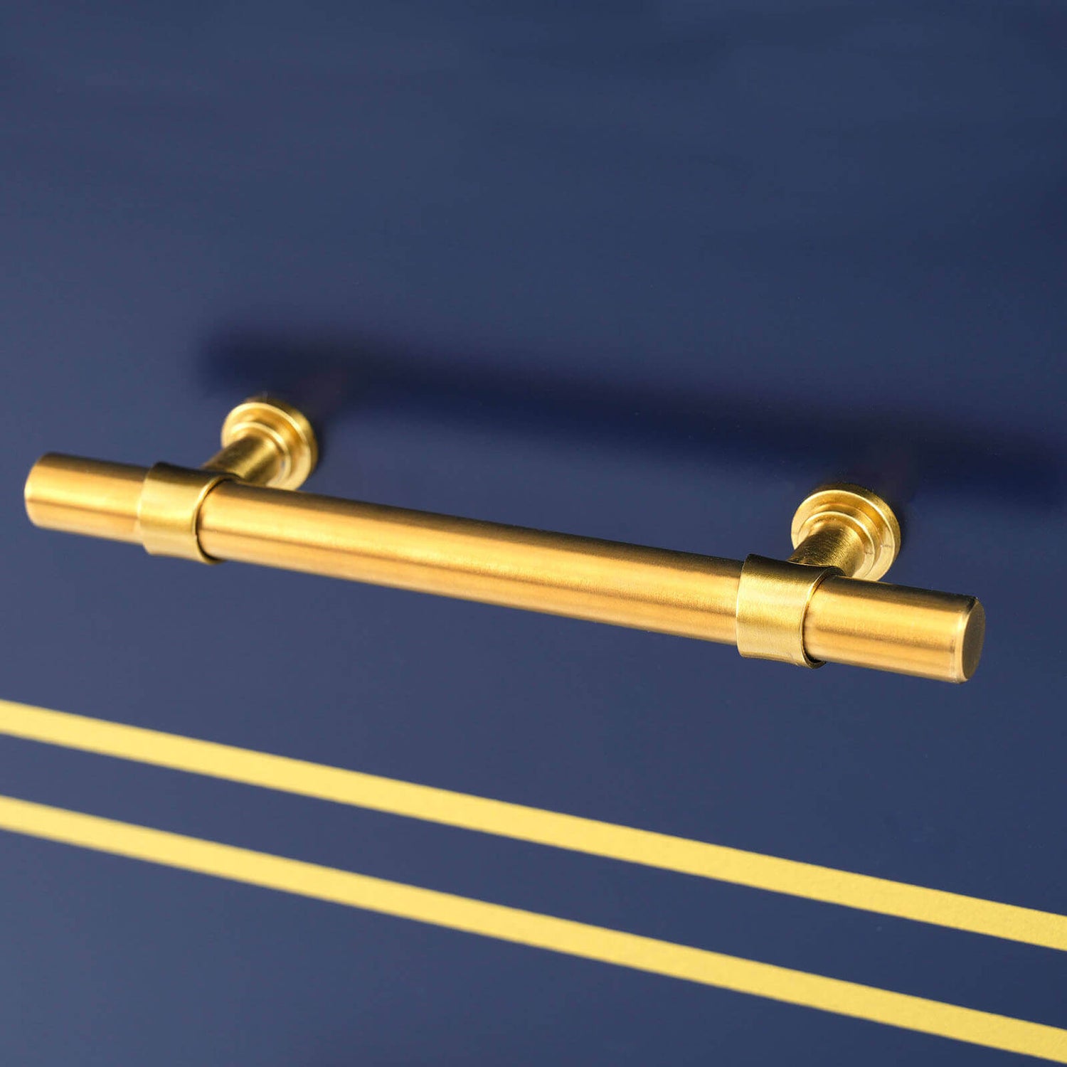 Close-up of Gold Hardware on Navy Blue Bathroom Vanity