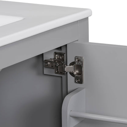 Close-up of the soft-close cabinet doors on gray vanity