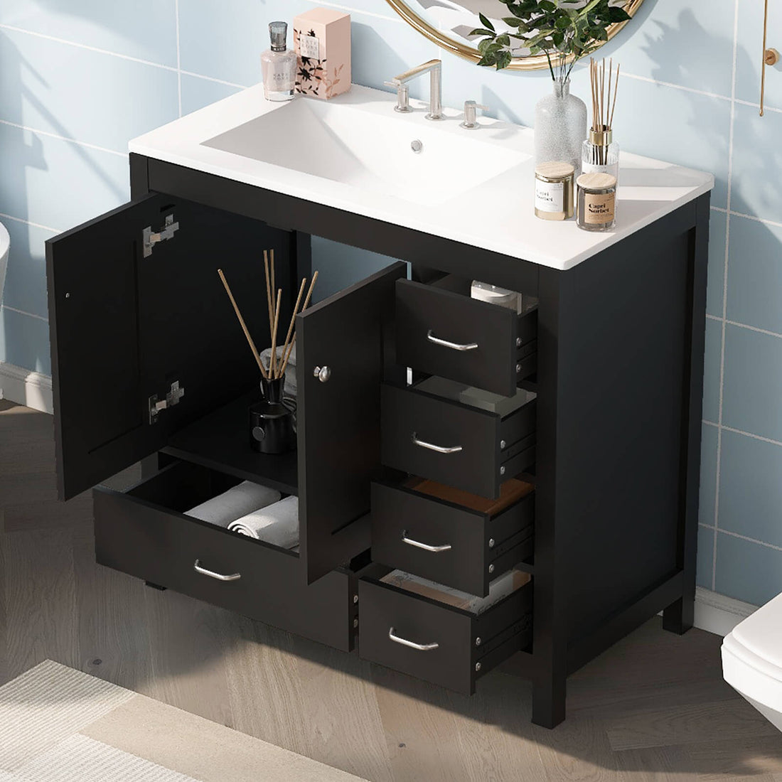 Compact black bathroom vanity with left offset sink and right side drawers