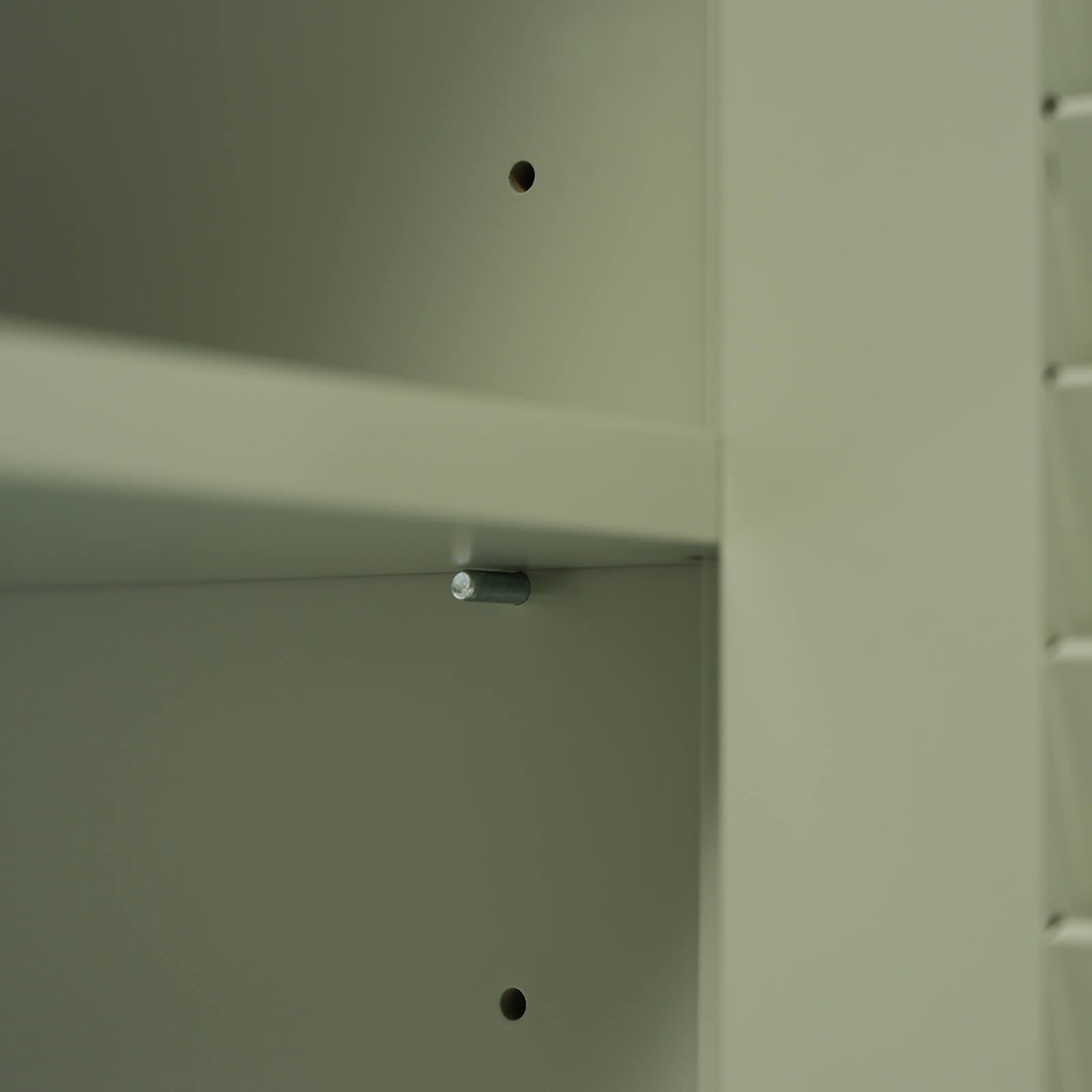 Detail of adjustable shelves on a 30 bathroom vanity with 2 louvered doors