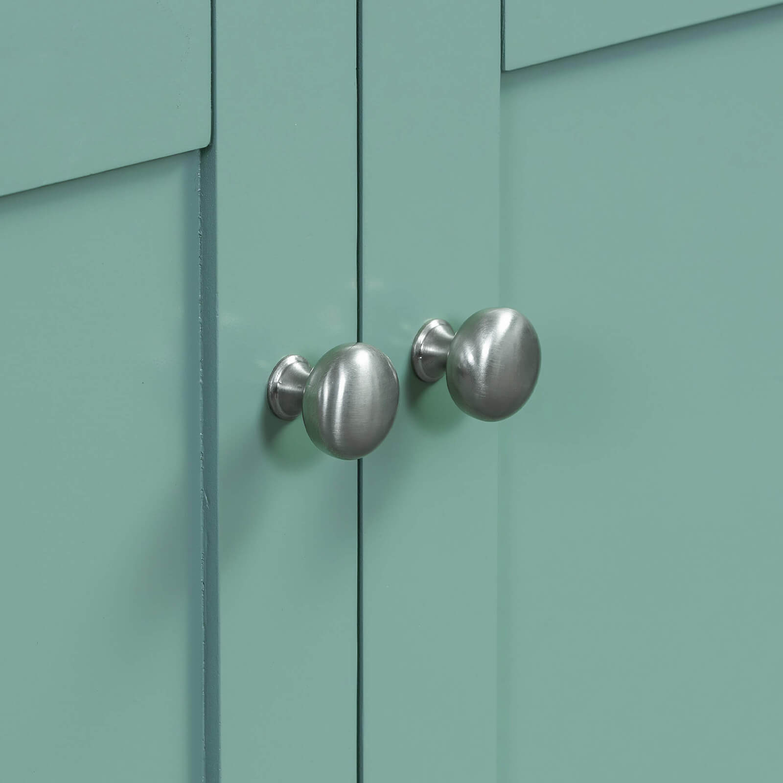 Detail of the handles on the 36 inch mint green bathroom vanity with integrated USB charging