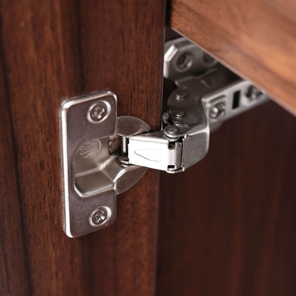 Detail of the soft-close mechanism on the 24 inch walnut freestanding bathroom vanity with open shelves