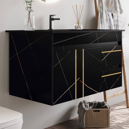 Elegant black floating vanity with golden accents and marble sink