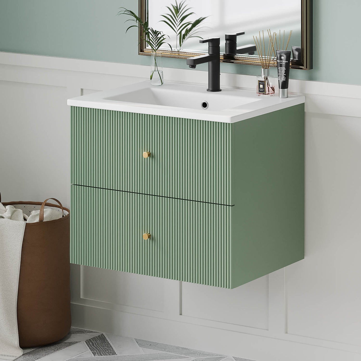 Elegant green floating vanity with premium ceramic sink and gold accents