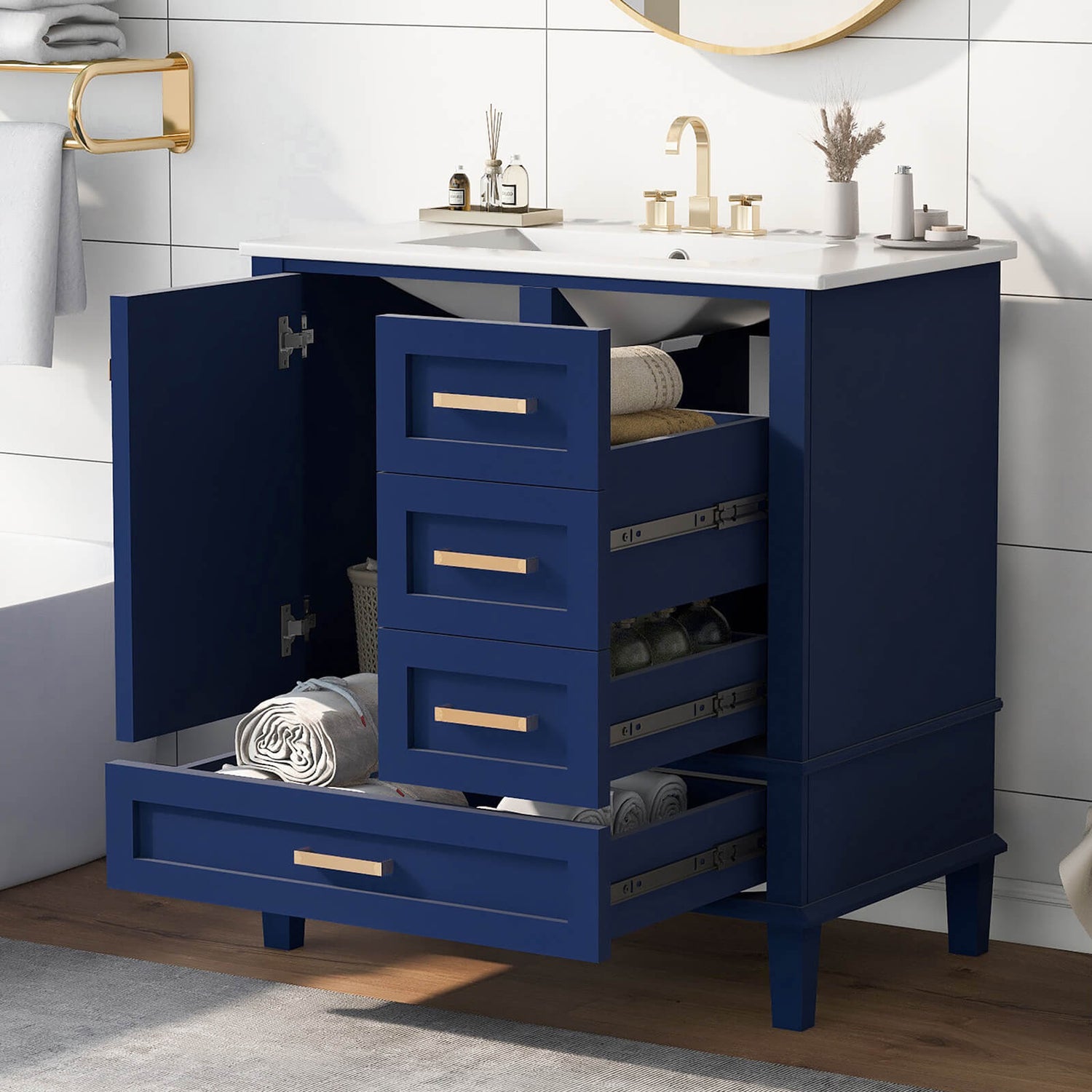 Elegant gold handles on navy blue bathroom vanity
