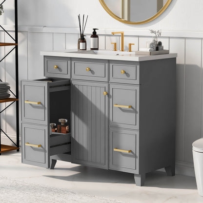 Grey vanity with gold drawer pulls and sleek design for contemporary bathrooms