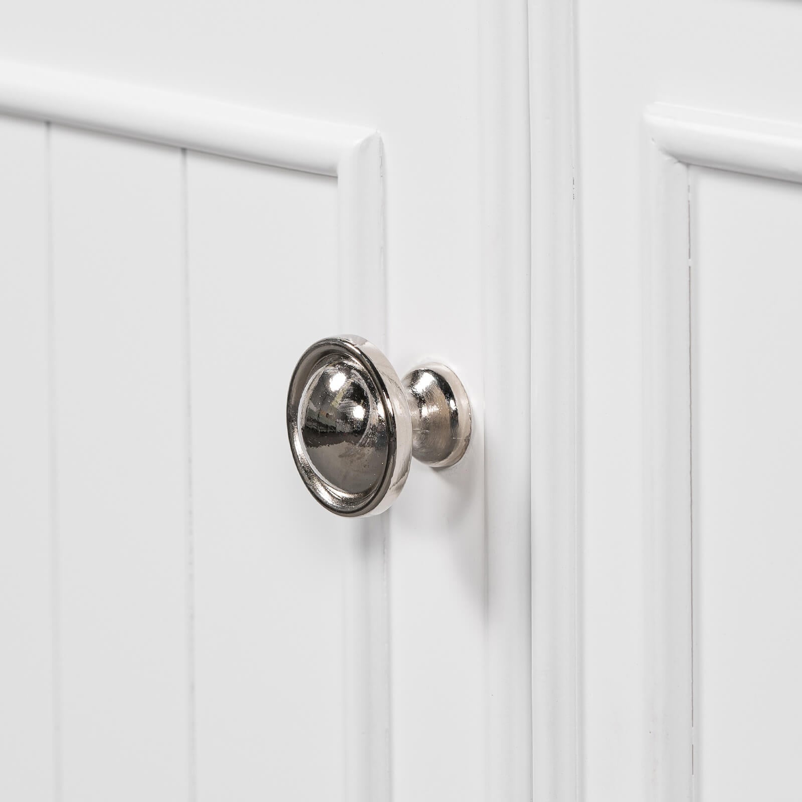 Handle detail on 36 inch white bathroom vanity cabinet with 4 drawers