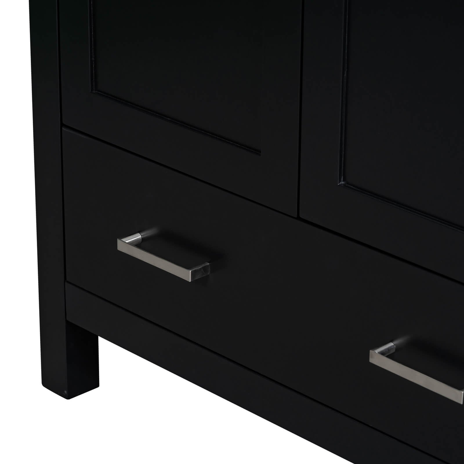 Handle detail on a 30 inch black bathroom vanity with built-in shelves