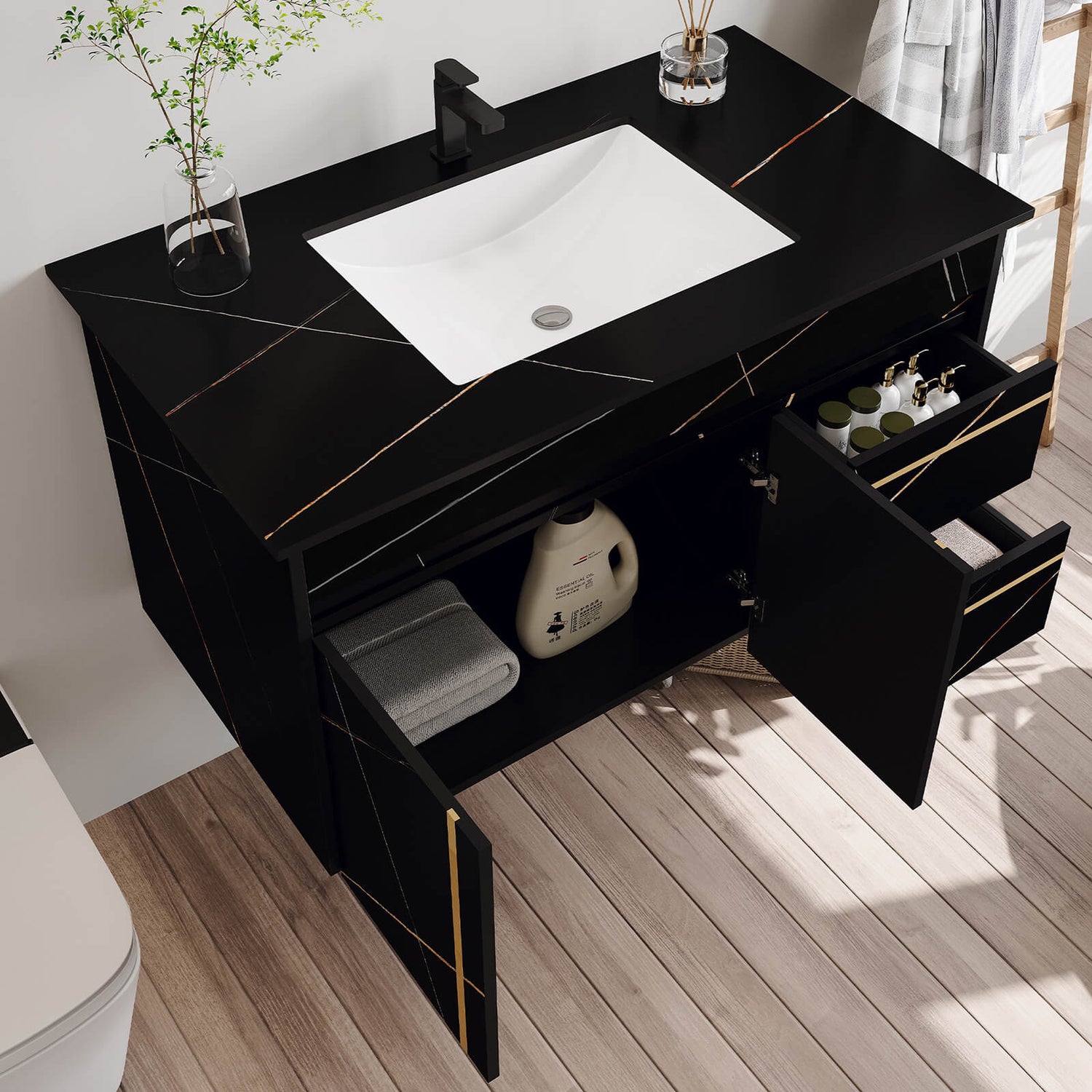 Modern floating bathroom vanity with elegant black base and golden accents