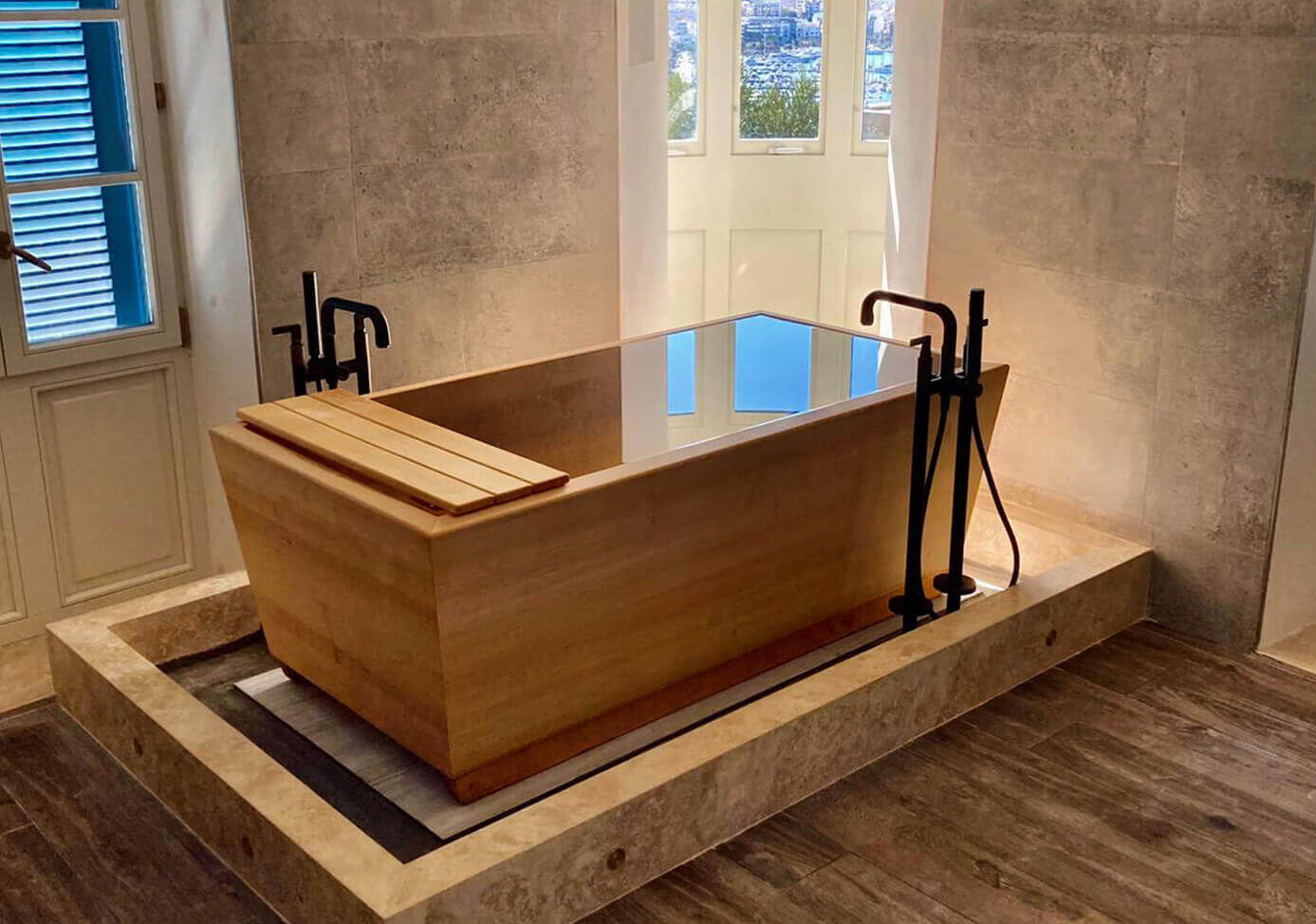 Ofuro bathtub matches the wooden floor