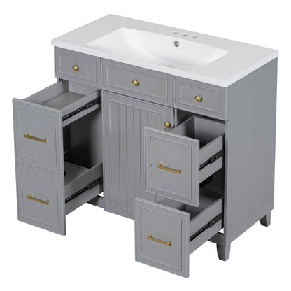 Resin sink with grey vanity and gold hardware in a modern bathroom